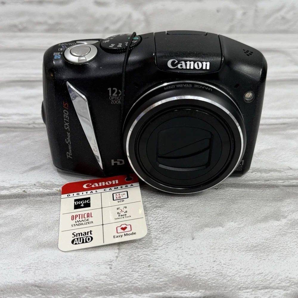 Canon SX130 IS Powershot Digital Camera 12x Optical Zoom 12.1 MP Black Excellent